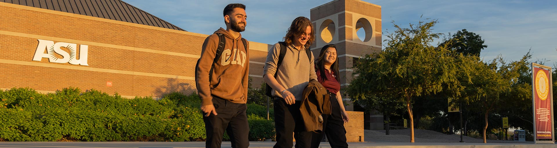 ASU students walking around the ASU West Valley campus at sunset