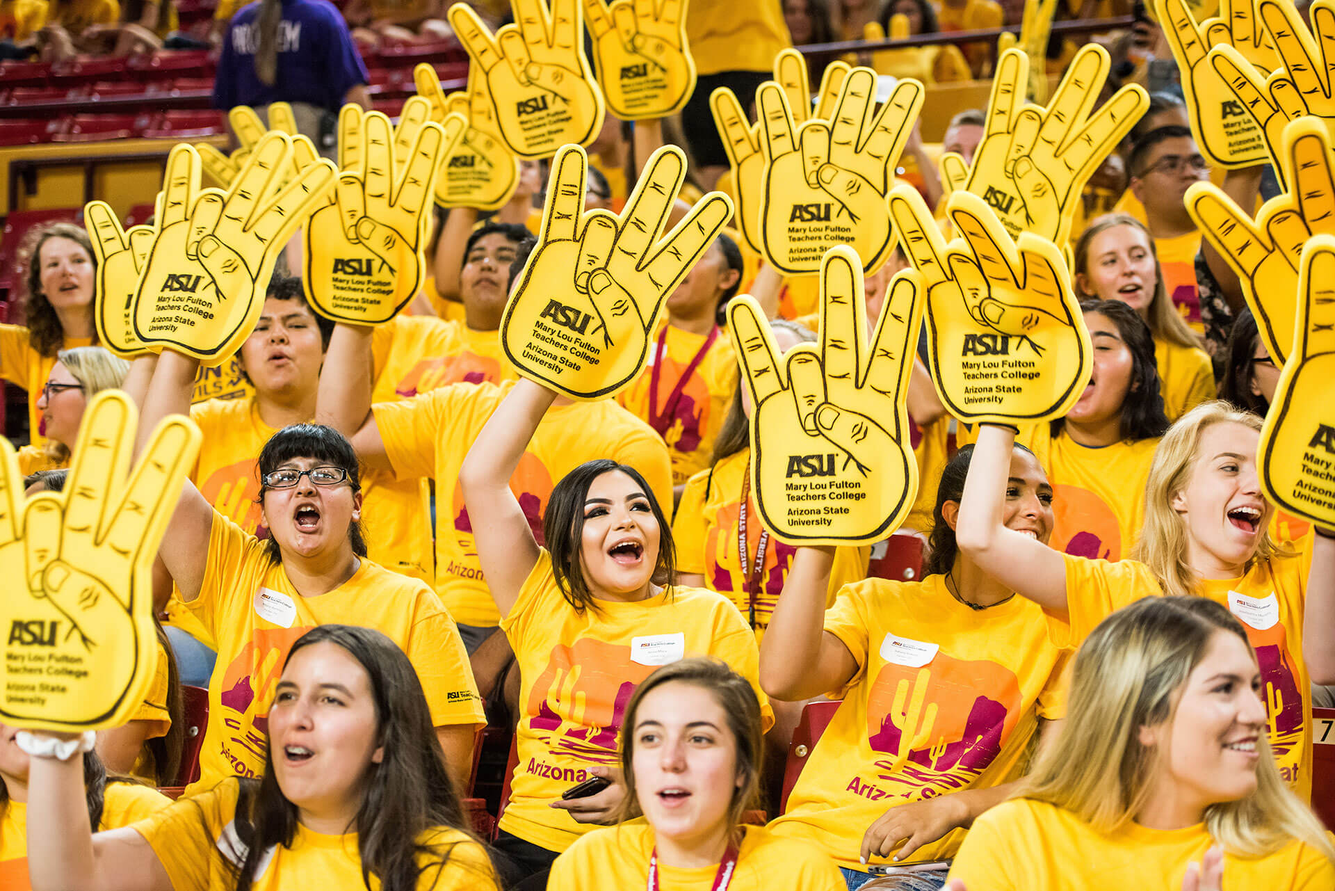 students cheering at welcome event