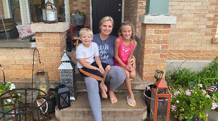 Taura Rush and her children outside of their home in Joseph City, Arizona