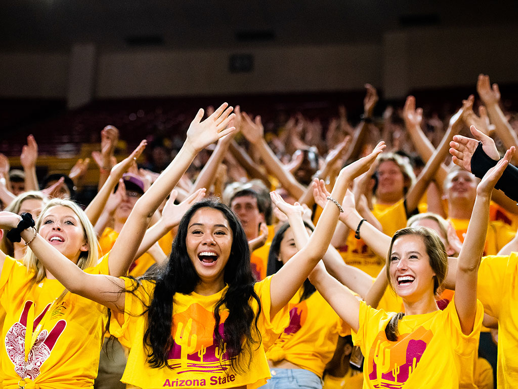 students cheering at welcome event