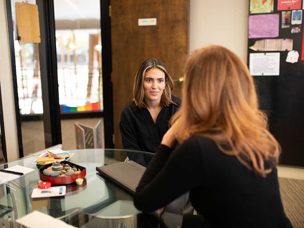 student in a student advisor office
