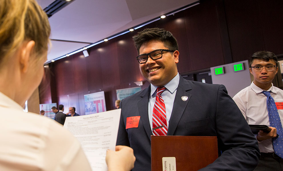 student attending a career fair event