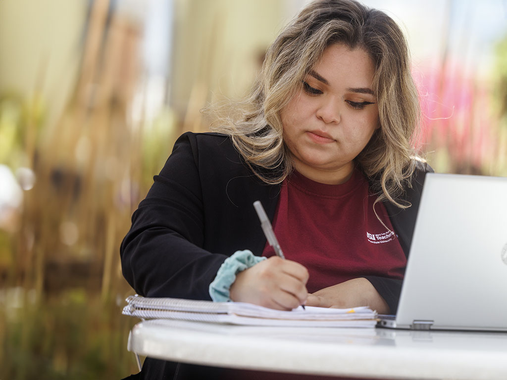 student working on homework
