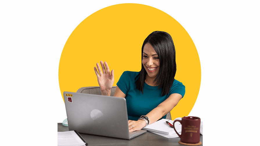 student attending an online class waiving to the screen