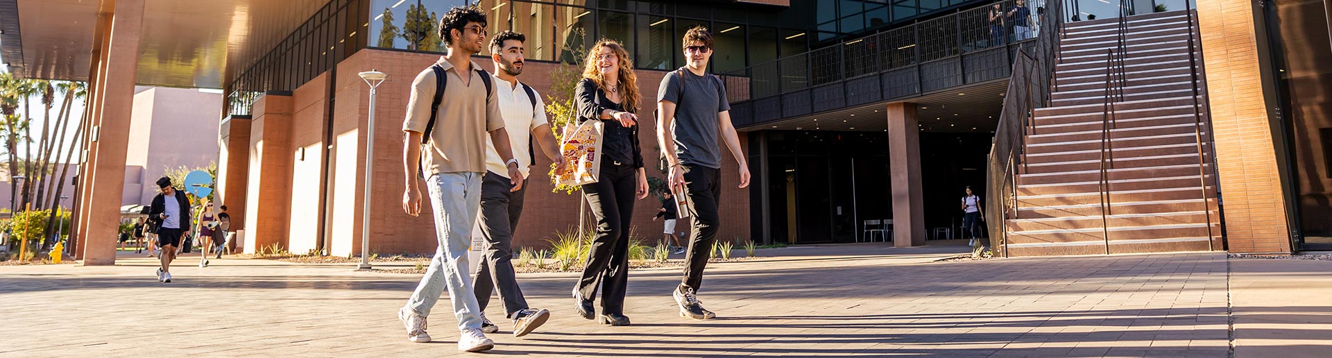 students walking by Wilson Hall at the ASU Tempe campus