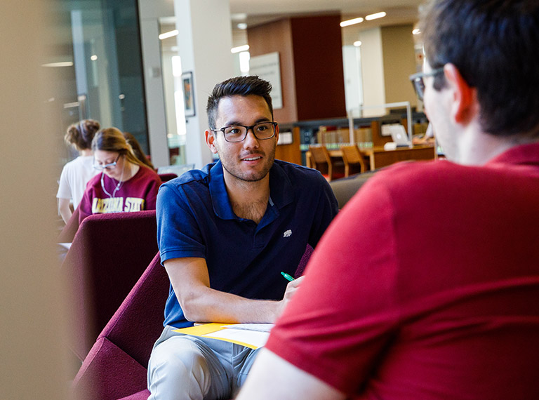 two people discussing a project