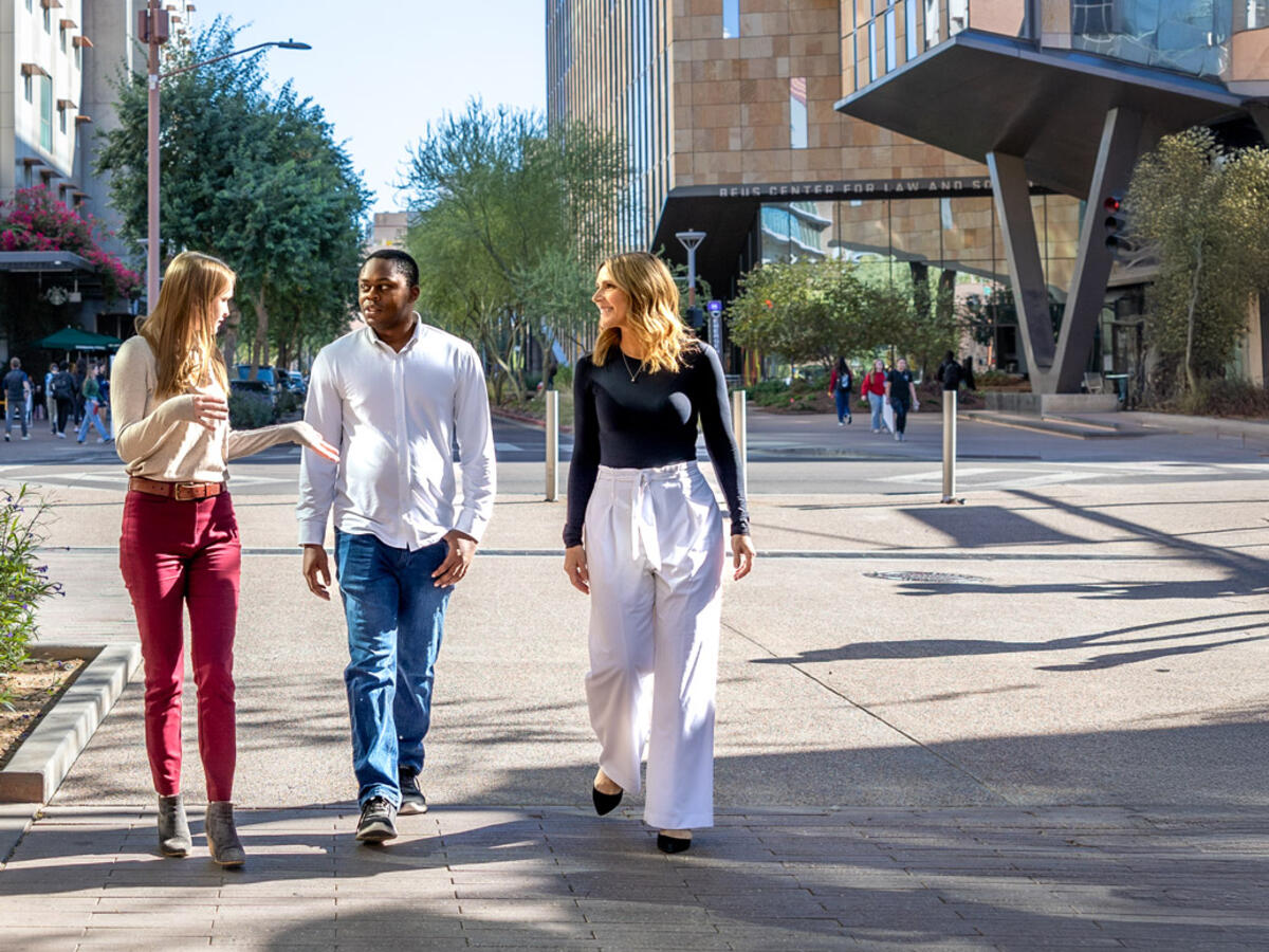 students walking near academic buildings